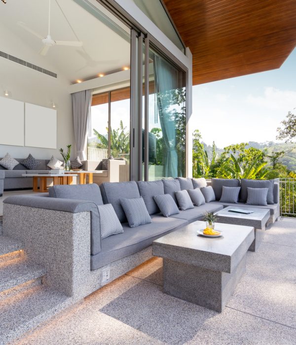 Interior and exterior design of pool villa, house and home feature sofa and cushion by pool terrace